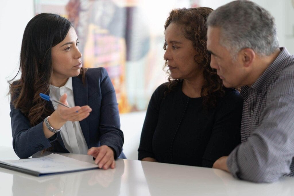 couple consulting with financial advisor social security